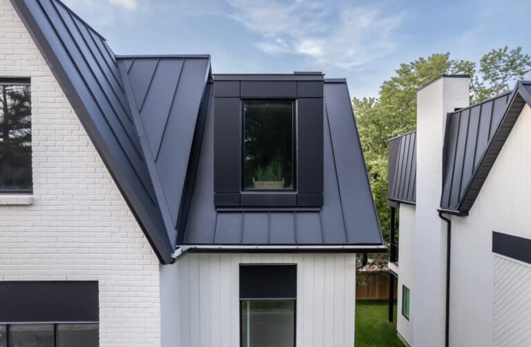 Standing-seam metal roof and dormer on a Veloce custom home